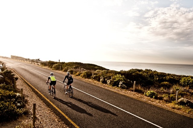 Sunday morning cruising along the waterfront of Barwon Heads - Torquay Road. Surfers and cyclists everywhere.